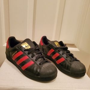 Black and Red Adidas superstars